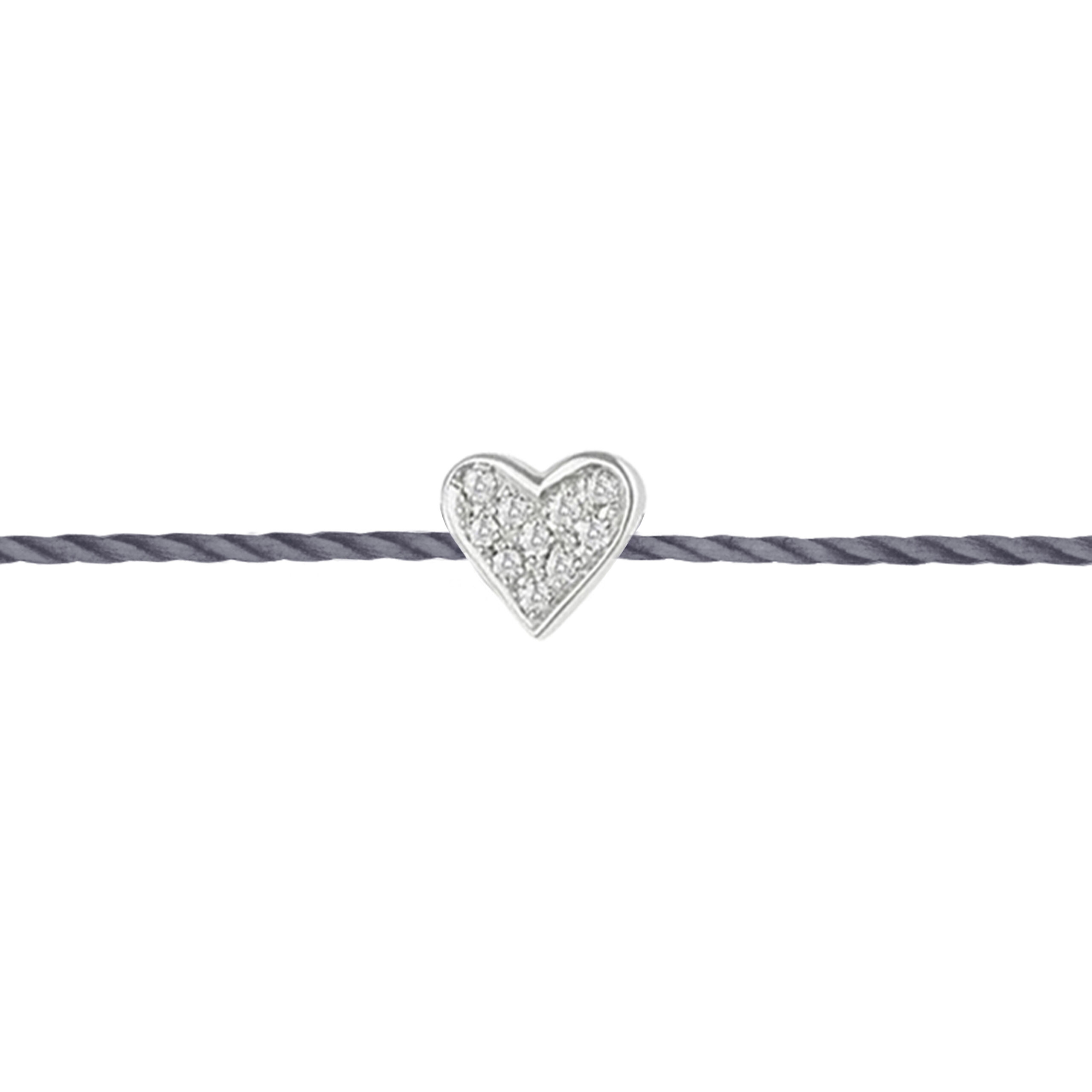 Thread bracelet with a heart paved with diamonds