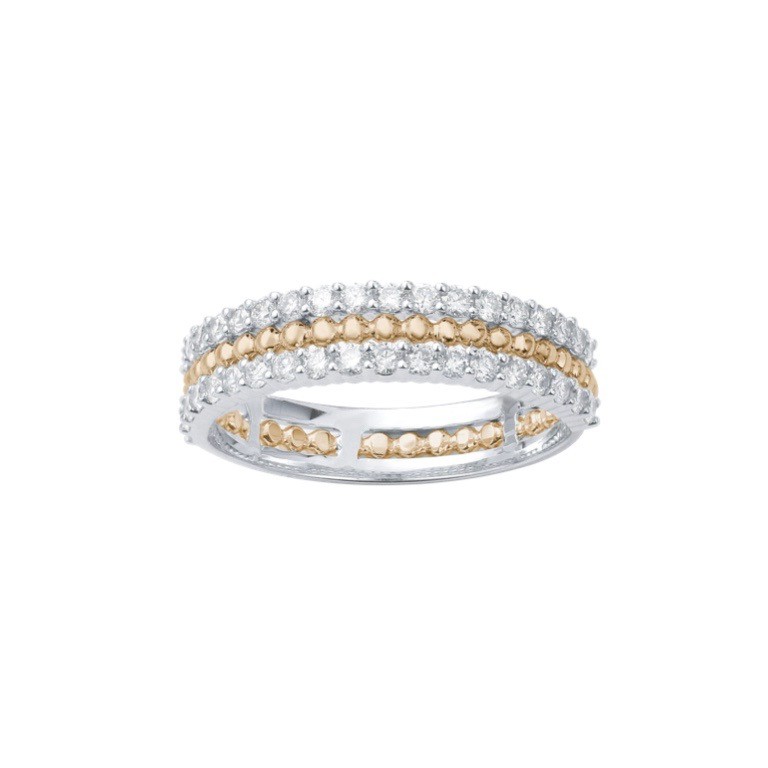 bague en or blanc et jaune et diamants à superposer ou à accumuler est prisé par les stars et célébrités. Ce bijou de joaillerie fine fabriqué en France est un cadeau idéal pour l'anniversaire d'une femme.